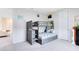 bedroom featuring a bunk bed, ample lighting, and easy access to additional space at 13829 Destin Beach Ln, Orlando, FL 32827