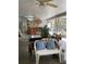 Enclosed lanai with bar and seating offering a unique space for entertaining or relaxing at 15683 Sw 46Th Cir, Ocala, FL 34473