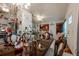 Elegant dining room with chandelier lighting and a large wood table setting at 1603 15Th, Sanford, FL 32771