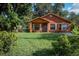 Charming one-story home featuring a well-maintained lawn and mature trees at 1603 15Th, Sanford, FL 32771