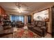 Relaxing living room with tile flooring, plush seating, and a view into the adjacent room at 1603 15Th, Sanford, FL 32771