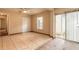 Bedroom with tile flooring, a ceiling fan, sliding glass doors to patio, and a closet at 1710 Espanola Ave, Daytona Beach, FL 32117