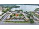 Aerial view of the apartment complex with views of the lake at 202 Georgetown Dr # C, Casselberry, FL 32707