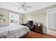 Bedroom featuring ceiling fan, natural light, a TV, and a dresser at 202 Georgetown Dr # C, Casselberry, FL 32707