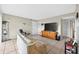 Neutral living room featuring tile flooring, a TV, and comfortable seating at 202 Georgetown Dr # C, Casselberry, FL 32707