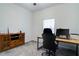 Well-lit bedroom featuring a desk and ample storage, perfect for study or work at 2043 Rock Maple Bnd, Kissimmee, FL 34746