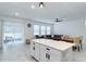 Open living space featuring tile floors and a sliding door that leads to the exterior at 2043 Rock Maple Bnd, Kissimmee, FL 34746