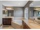 Large bathroom with garden tub, dual sinks, and tile surround at 2122 Bent Grass Ave, Ocoee, FL 34761
