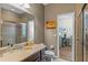 Clean bathroom with a glass-enclosed shower and an adjacent bedroom/office space at 2122 Bent Grass Ave, Ocoee, FL 34761