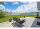 Spacious backyard featuring a comfortable bench, vibrant plants, and a well-maintained lawn at 2190 Northland Rd, Mount Dora, FL 32757