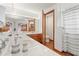 Well-lit bathroom with a large mirror, wood cabinetry, and a shower with a curtain at 2190 Northland Rd, Mount Dora, FL 32757