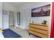 The bedroom features white walls, an entertainment center, and bright natural light from the outdoors at 2662 Roadster Ln, Kissimmee, FL 34746