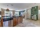 Spacious kitchen featuring modern appliances, granite counters, and access to living areas at 2662 Roadster Ln, Kissimmee, FL 34746
