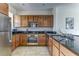 Well-equipped kitchen featuring stainless steel appliances and sleek granite countertops at 2662 Roadster Ln, Kissimmee, FL 34746