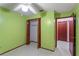 Bedroom features a ceiling fan, tiled floors, and closet at 2942 N Chickasaw Trl, Orlando, FL 32817
