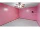 Spacious bedroom featuring tile floors, fan and a bright wall color at 2942 N Chickasaw Trl, Orlando, FL 32817