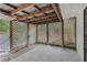 Enclosed back patio with lattice walls and concrete floor at 2942 N Chickasaw Trl, Orlando, FL 32817