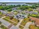 Aerial view of property highlighting the pool, solar panels, and proximity to the lake at 317 Benton St, Orlando, FL 32839
