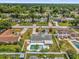 Aerial view showing the home's position within a tree-lined neighborhood at 317 Benton St, Orlando, FL 32839