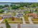 Aerial view of a neighborhood showcasing the home's location relative to the lake and the city at 317 Benton St, Orlando, FL 32839