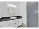 Updated bathroom features modern vanity, shower, and bright lighting at 317 Benton St, Orlando, FL 32839