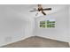 Bright bedroom with a large window and spacious closet at 317 Benton St, Orlando, FL 32839