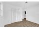 Neutral bedroom with natural light and closet at 317 Benton St, Orlando, FL 32839