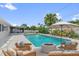 Stunning outdoor pool area with modern furniture at 317 Benton St, Orlando, FL 32839