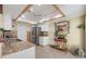 An updated kitchen with granite counters, stainless steel appliances, and recessed lighting at 5059 Jamaica Cir # 15, Orlando, FL 32808