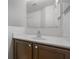 Bathroom vanity with modern sink, updated fixture, and framed mirror at 5671 Sycamore Canyon Dr, Kissimmee, FL 34758