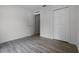 Cozy bedroom boasts modern flooring, closet, and fresh, neutral paint at 5671 Sycamore Canyon Dr, Kissimmee, FL 34758