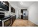 Traditional Kitchen featuring stainless steel appliances, and tile floors at 5671 Sycamore Canyon Dr, Kissimmee, FL 34758