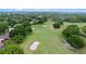 Expansive golf course view showcasing lush greenery, mature trees and multiple sand traps at 6631 Crenshaw Dr, Orlando, FL 32835
