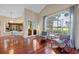 Living room with hardwood floors and backyard view at 6631 Crenshaw Dr, Orlando, FL 32835