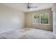 Bedroom with ceiling fan, a window and closet at 754 E Michigan St # 182, Orlando, FL 32806
