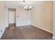 Dining area with chandelier and tiled floor at 754 E Michigan St # 182, Orlando, FL 32806