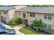 Well-maintained, two-story condo building with lush landscaping and convenient parking at 754 E Michigan St # 182, Orlando, FL 32806
