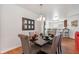 Stylish dining area with a dark wood table and seating for six, perfect for formal dining occasions at 9110 Stromboli Ct, Kissimmee, FL 34747