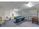 Spacious garage with a pool table, foosball table, and overhead lighting at 9110 Stromboli Ct, Kissimmee, FL 34747
