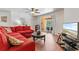 Spacious living room with sliding glass doors leading to the outdoor patio, merging indoor and outdoor living at 9110 Stromboli Ct, Kissimmee, FL 34747
