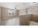 Bonus room with natural lighting coming through the large window at 1030 Bending Oak Trl, Winter Garden, FL 34787