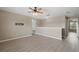 Bright bonus room featuring wood-style floors and neutral walls at 1030 Bending Oak Trl, Winter Garden, FL 34787
