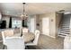 Dining room with modern lighting fixture and views to kitchen at 1030 Bending Oak Trl, Winter Garden, FL 34787