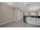 Modern kitchen featuring stainless steel appliances and sleek countertops at 1030 Bending Oak Trl, Winter Garden, FL 34787