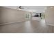 Open floor plan featuring the living room, kitchen bar and dining area at 1030 Bending Oak Trl, Winter Garden, FL 34787