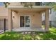 Covered patio with ample space, sliding glass door, and fenced yard at 1030 Bending Oak Trl, Winter Garden, FL 34787
