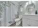 Well-maintained bathroom with a white vanity and new flooring and fixtures at 104 Autumn Dr, Longwood, FL 32779
