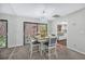 Cozy dining area adjacent to the kitchen with backyard access, perfect for indoor-outdoor dining and entertaining at 104 Autumn Dr, Longwood, FL 32779