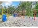 Community playground with swings, slide, and climbing structure in a park-like setting at 104 Autumn Dr, Longwood, FL 32779