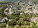 Expansive aerial view of the neighborhood highlighting the lush greenery and well-maintained homes at 1121 Northern Way, Winter Springs, FL 32708
